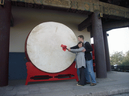 Tim and Miaomiao with a drum at the Drum Tower of Xi`an