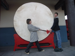 Tim and Miaomiao with a drum at the Drum Tower of Xi`an