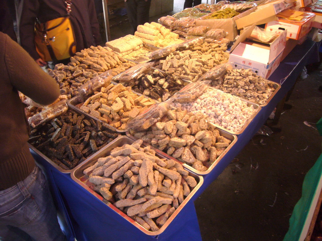 Dried food at market stalls at the Beiyuanmen Islamic Street