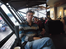 Tim in a restaurant at the Bell and Drum Tower Square