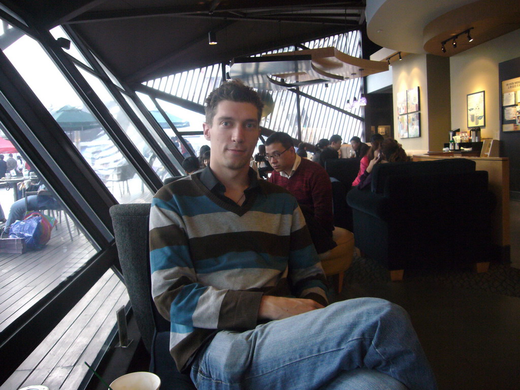 Tim in a restaurant at the Bell and Drum Tower Square