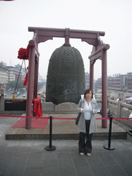 Miaomiao with a bell at the Bell Tower of Xi`an