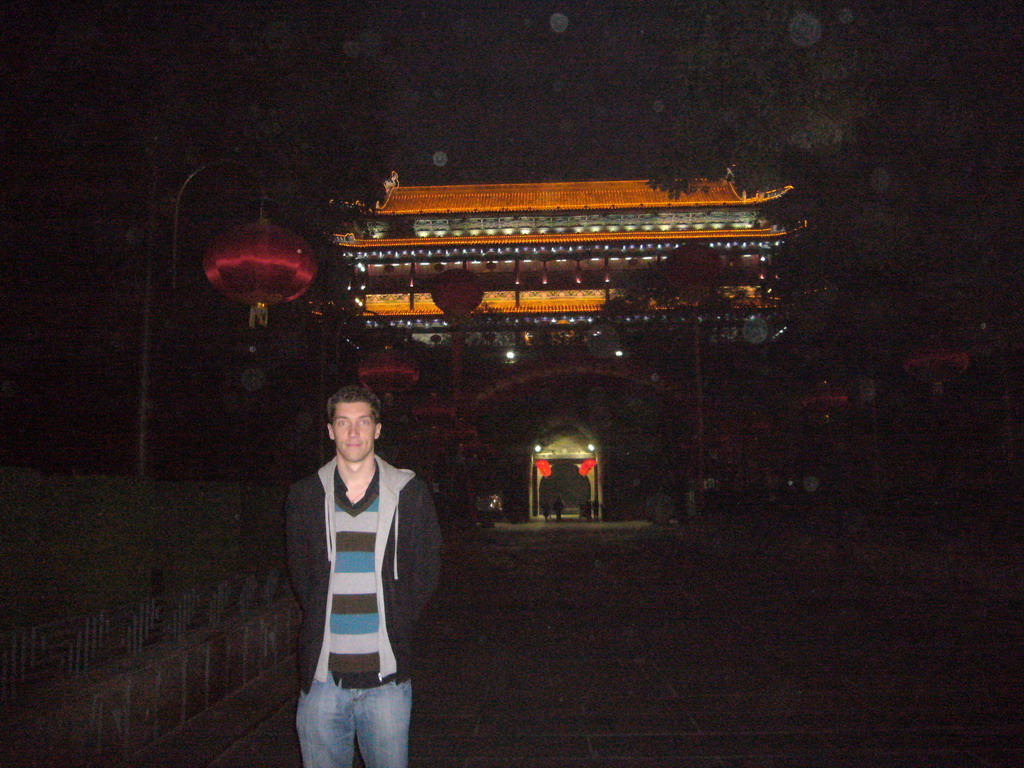 Tim in front of the North Gate of the Xi`an City Wall, by night