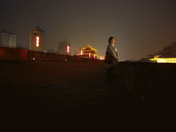 Miaomiao on top of the Xi`an City Wall, by night