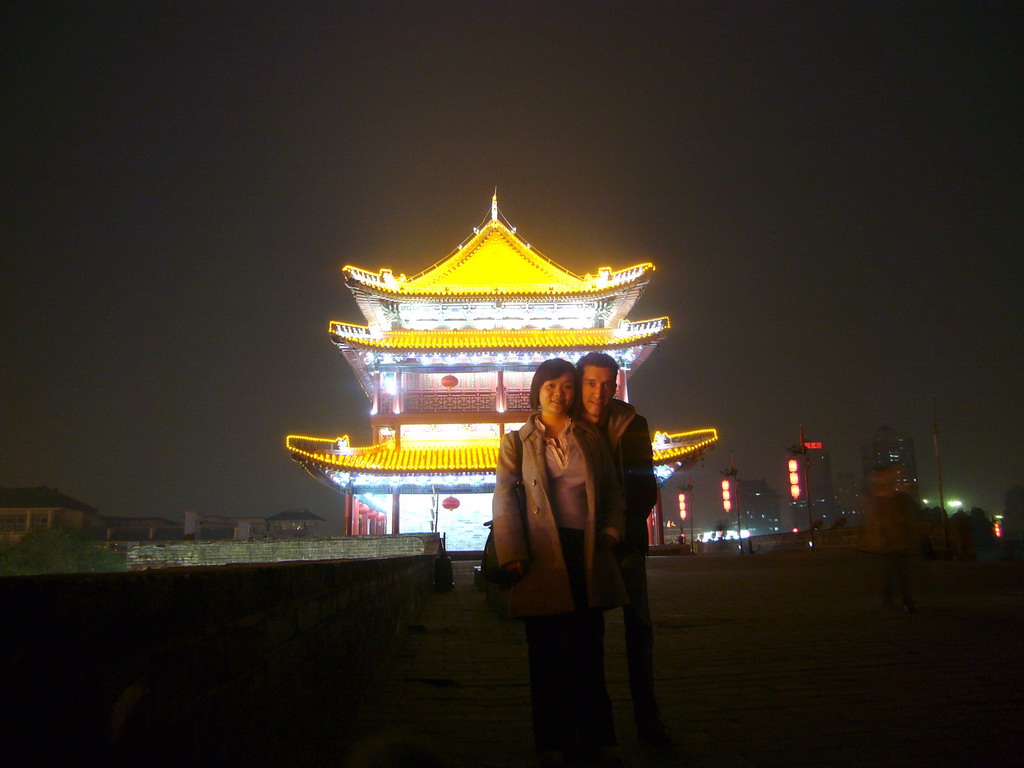 Tim and Miaomiao on top of the Xi`an City Wall, by night