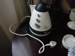 xian_131 - 145 kb - 1024x768 - Water cooker with broken power cable in our room at a hotel in the city center Water cooker with broken power cable in our room at a hotel in the city center
