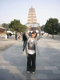 Miaomiao in front of the south side of the Giant Wild Goose Pagoda at the Daci`en Temple