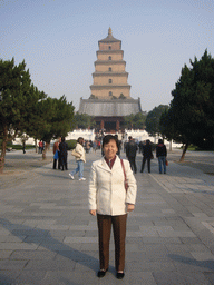 Miaomiao`s mother in front of the south side of the Giant Wild Goose Pagoda at the Daci`en Temple