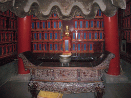 Buddha statue and altar in a building at the south side of the Daci`en Temple