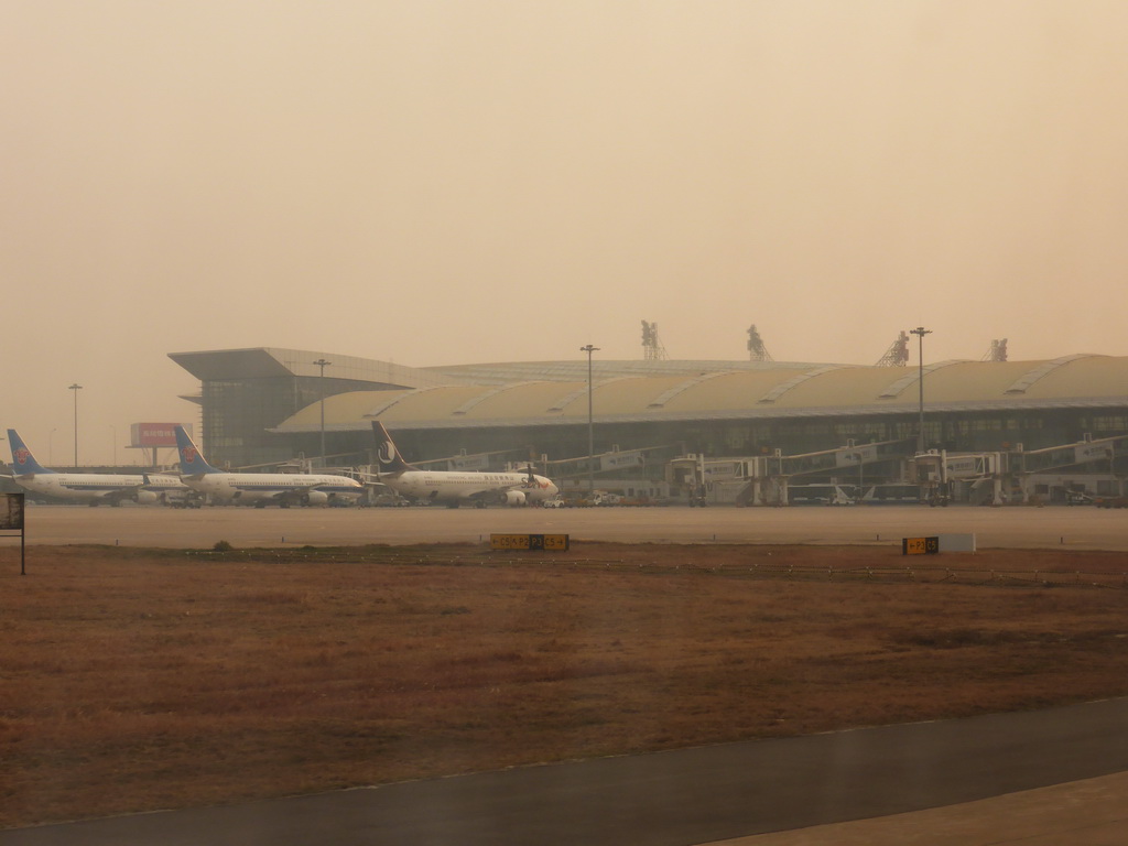 Airplanes at Wuhan Tianhe International Airport, viewed from the airplane from Haikou