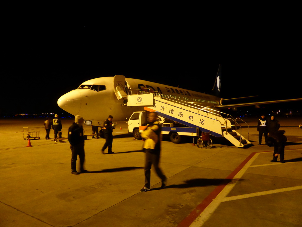 Our airplane at Yantai Laishan International Airport, by night