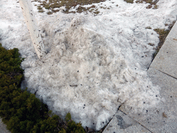 Snow at the side of the road at the Elder Welfare Services Center