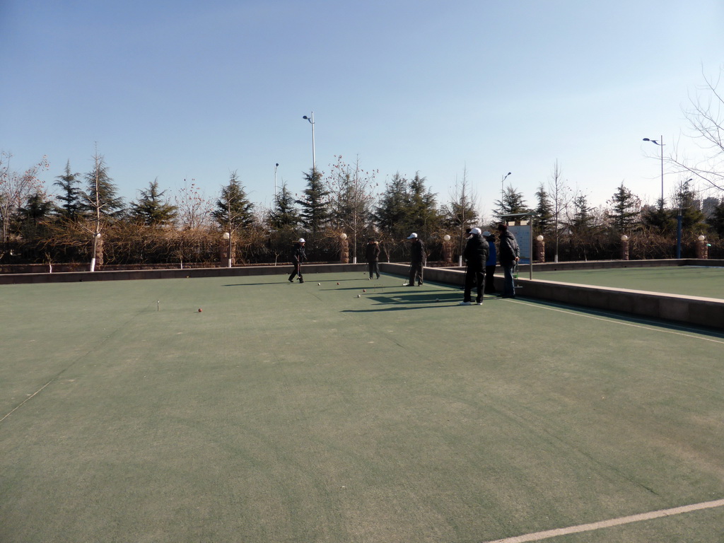 People doing sports at a playground at the Elder Welfare Services Center