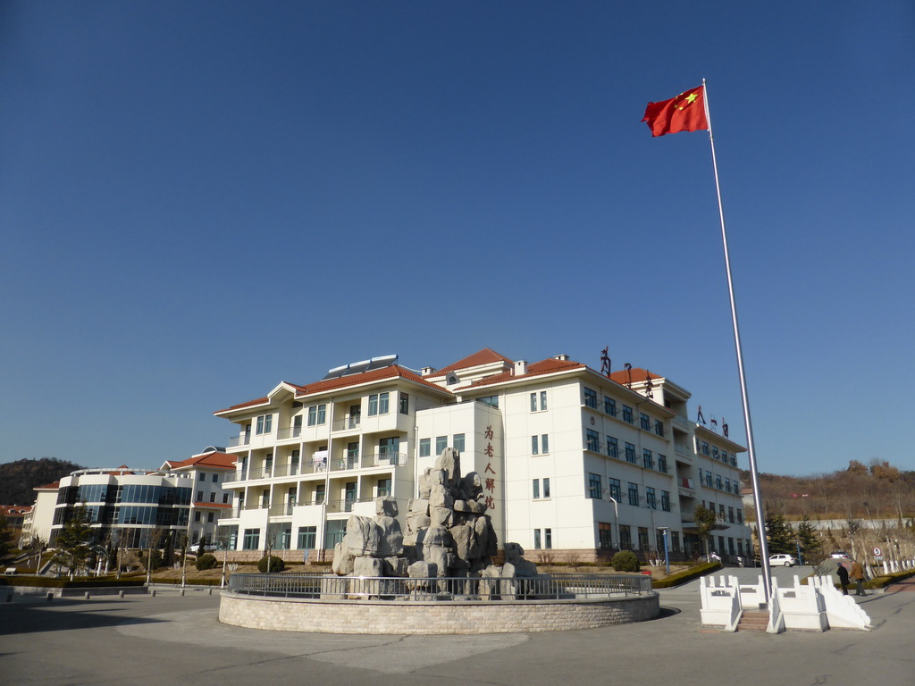 Buildings and a Chinese flag at the Elder Welfare Services Center