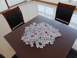 Table with Mahjong tiles at Miaomiao`s grandmother`s building at the Elder Welfare Services Center