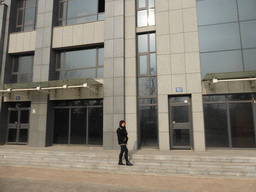 Miaomiao in front of the office building of her uncle and aunt, at Zhichu Road