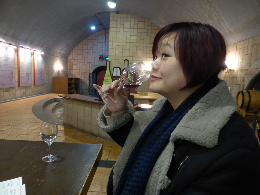 Miaomiao tasting a red wine in the Underground Cellar at the ChangYu Wine Culture Museum