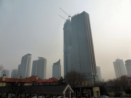 Park in front of the ChangYu Wine Culture Museum, and skyscrapers at Dama Road and Jiefang Road