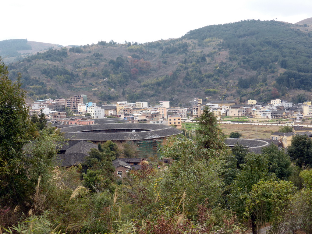 The Qiaofu Lou, Chengqi Lou and Beichen Lou buildings of the Gaobei Tulou Cluster, viewed from the staircase to the Yongding Scenic Area viewing point