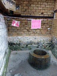 Pit at the first inner layer on the ground level of the Chengqi Lou building of the Gaobei Tulou Cluster