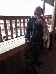Miaomiao at the top level of the Shize Lou building of the Gaobei Tulou Cluster