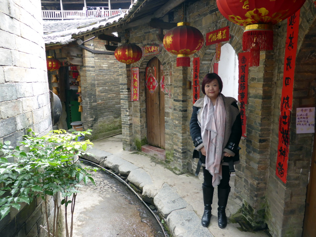 Miaomiao at the second inner layer on the ground level of the Chengqi Lou building of the Gaobei Tulou Cluster
