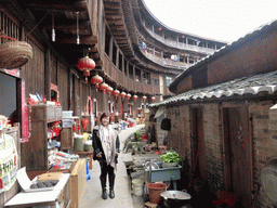 Miaomiao at the outer layer with all four levels of the Chengqi Lou building of the Gaobei Tulou Cluster