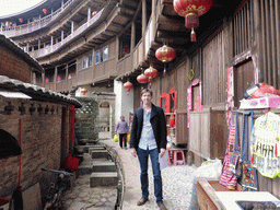 Tim at the outer layer with all four levels of the Chengqi Lou building of the Gaobei Tulou Cluster