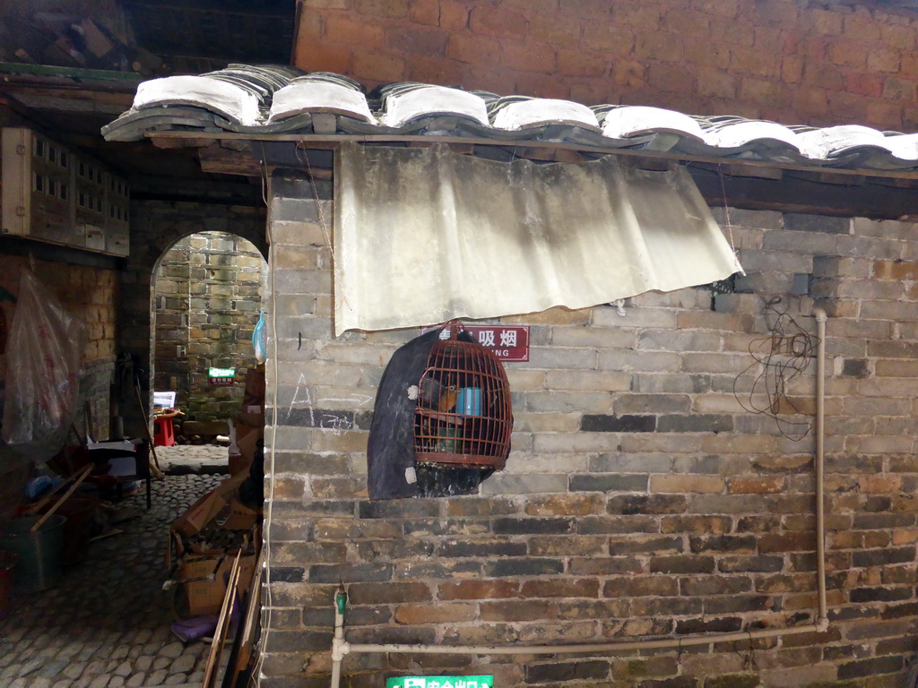 Bird cage at the outer layer on the ground level of the Chengqi Lou building of the Gaobei Tulou Cluster