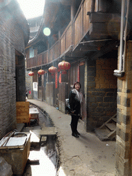 Miaomiao at the first inner layer of the Chengqi Lou building of the Gaobei Tulou Cluster