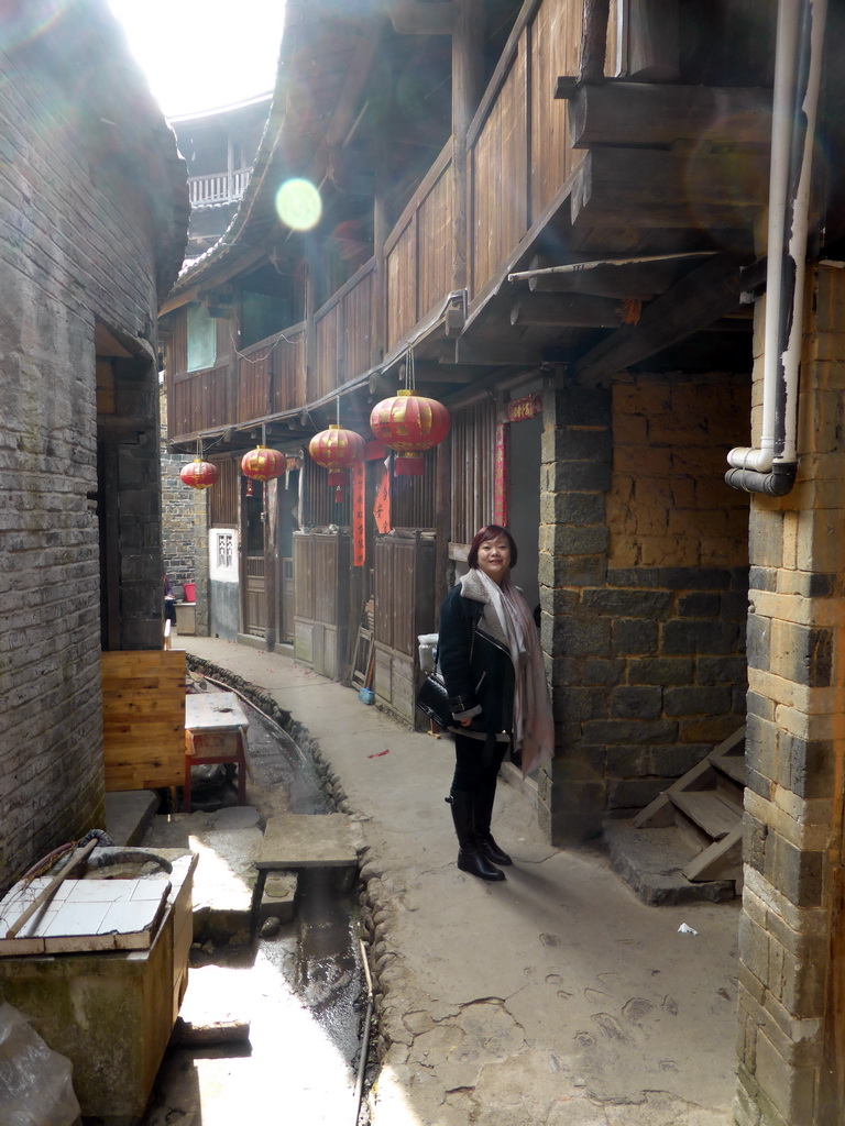 Miaomiao at the first inner layer of the Chengqi Lou building of the Gaobei Tulou Cluster