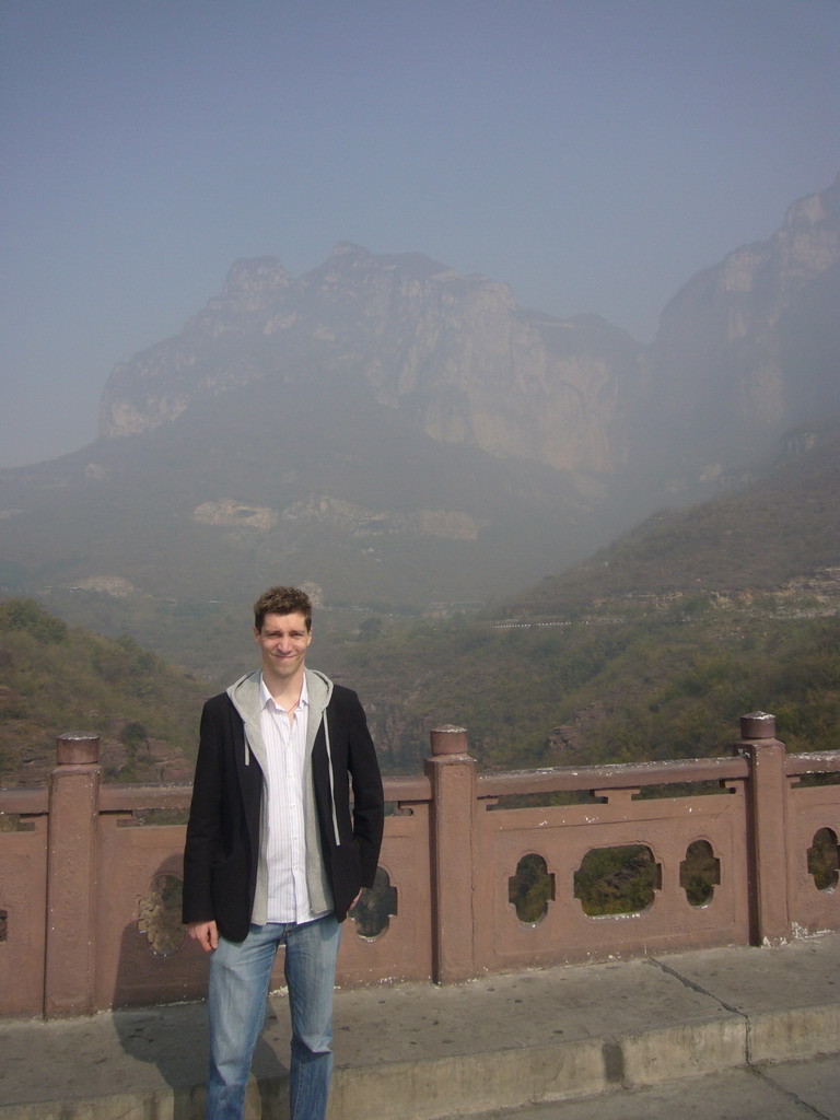 Tim with mountains at the Mount Yuntaishan Global Geopark