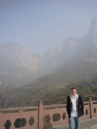 Tim with mountains at the Mount Yuntaishan Global Geopark
