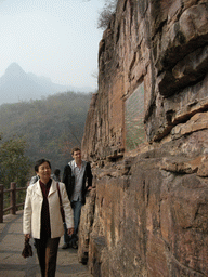 Tim and Miaomiao`s mother at the red cliff and severed wall at the Red Stone Gorge at the Mount Yuntaishan Global Geopark