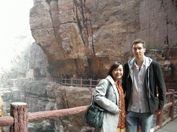 Tim and Miaomiao at the bridge at the Red Stone Gorge at the Mount Yuntaishan Global Geopark, with a view on the river