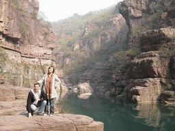 Tim and Miaomiao in front of the river at the Red Stone Gorge at the Mount Yuntaishan Global Geopark