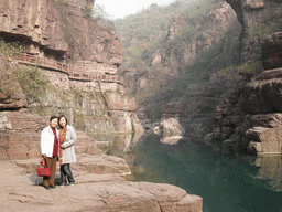 Miaomiao and her mother in front of the river at the Red Stone Gorge at the Mount Yuntaishan Global Geopark