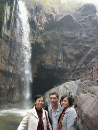 Tim, Miaomiao and Miaomiao`s mother at the waterfall at the Red Stone Gorge at the Mount Yuntaishan Global Geopark