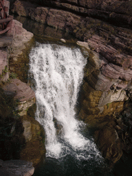 Waterfall at the Red Stone Gorge at the Mount Yuntaishan Global Geopark, viewed from the mountainside path