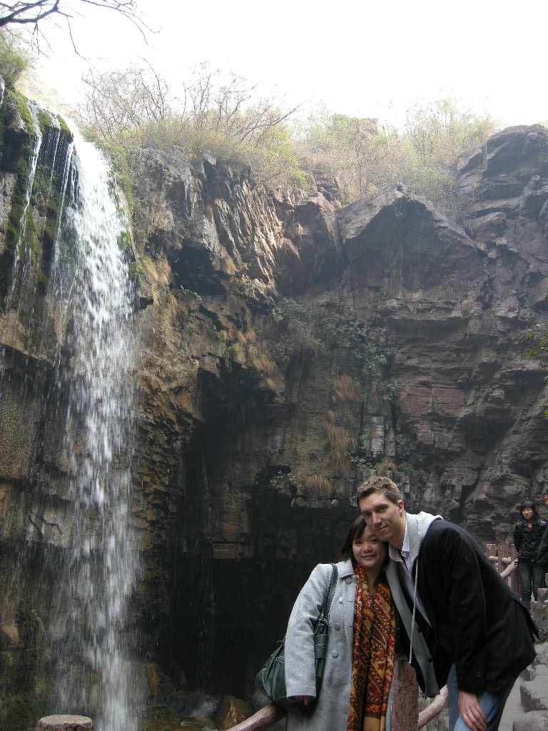 Tim and Miaomiao at the waterfall at the Red Stone Gorge at the Mount Yuntaishan Global Geopark