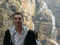 Tim and Miaomiao with waterfalls at the Red Stone Gorge at the Mount Yuntaishan Global Geopark