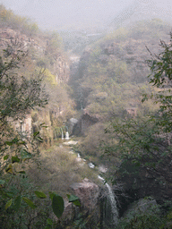 Waterfalls at the Red Stone Gorge at the Mount Yuntaishan Global Geopark, viewed from the mountainside path