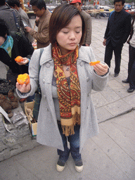 Miaomiao eating fruit at the Mount Yuntaishan Global Geopark