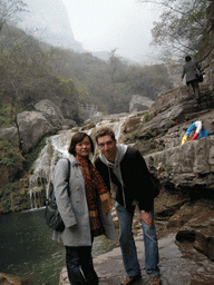 Tim and Miaomiao at a waterfall at the Tanpu Gorge at the Mount Yuntaishan Global Geopark