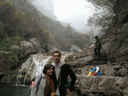 Tim and Miaomiao at a waterfall at the Tanpu Gorge at the Mount Yuntaishan Global Geopark