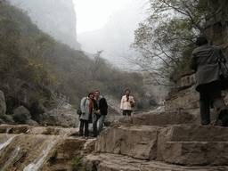 Tim, Miaomiao and Miaomiao`s mother at a waterfall at the Tanpu Gorge at the Mount Yuntaishan Global Geopark
