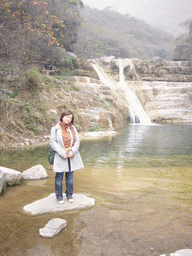 Miaomiao at a waterfall at the Tanpu Gorge at the Mount Yuntaishan Global Geopark