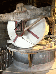 Chalk grinding stone at the ground floor of the De Kat windmill at the Zaanse Schans neighbourhood