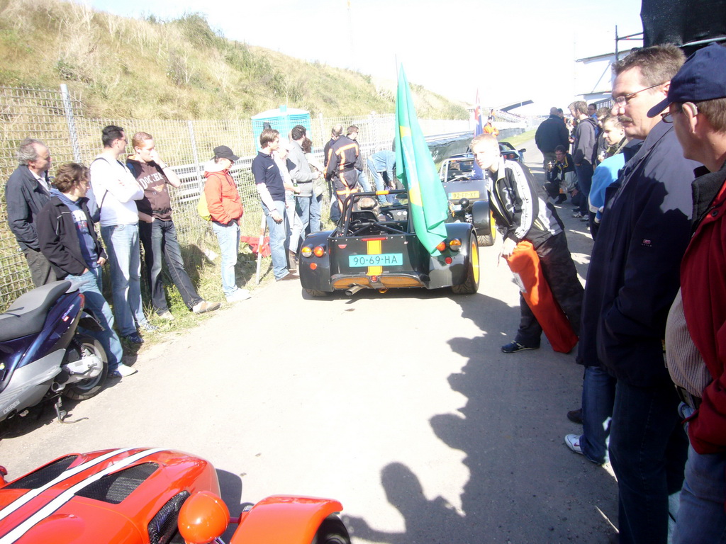 Old race cars with flags at Circuit Zandvoort, during the flag parade of the 2007-08 Dutch A1 Grand Prix of Nations