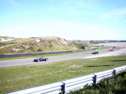 Old race cars with flags at Circuit Zandvoort, during the flag parade of the 2007-08 Dutch A1 Grand Prix of Nations